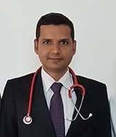 Dr. Tats Kumar Joshi